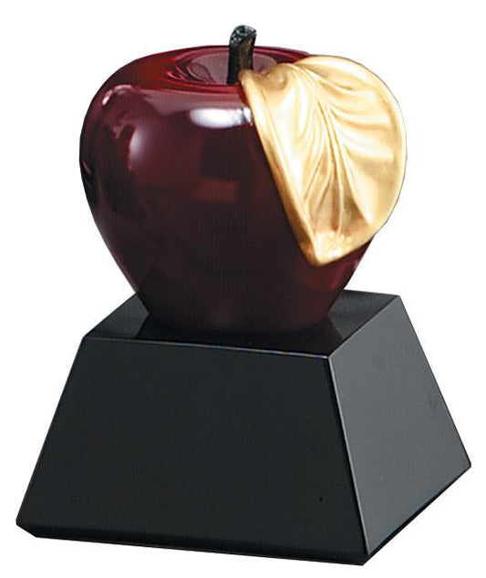 Apple with gold leaf on black base