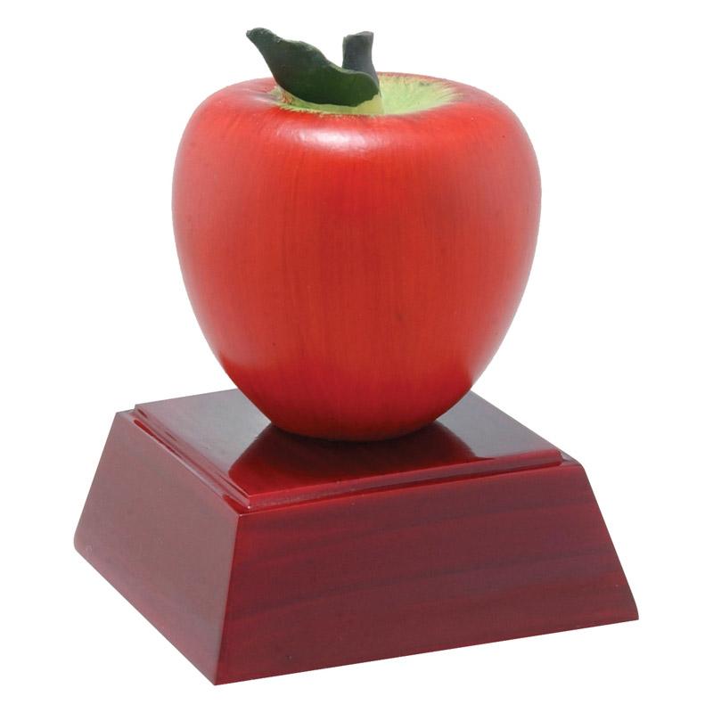 Red colored apple on rosewood base