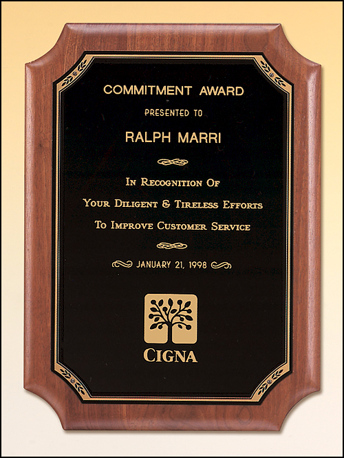 Walnut plaque with notched corners with a black brass plate. Available in 4 sizes.