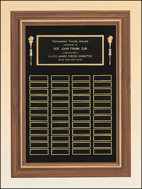 Perpetual plaque with solid American walnut frame on a black velour background with individual black brass plates 0.875"x2.75". Available in 3 plate combinations.