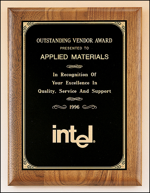 Walnut plaque with a precision elliptical edge with a black brass plate with printed border. Available in 4 sizes.