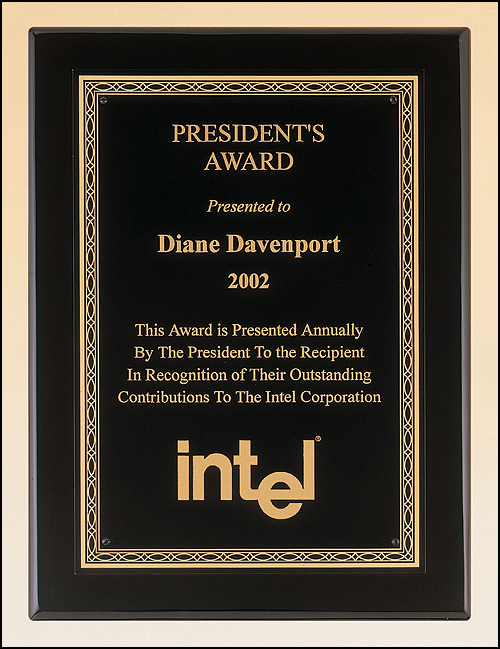 Black piano finish plaque with a black brass plate and gold braided design border. Available in 4 sizes