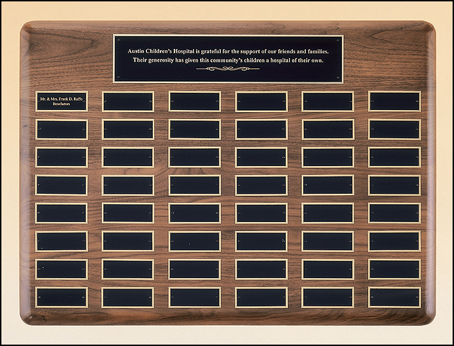 Solid American walnut perpetual plaque with individual black brass plates are 1.50"x3.75". Available in 5 plate combinations.