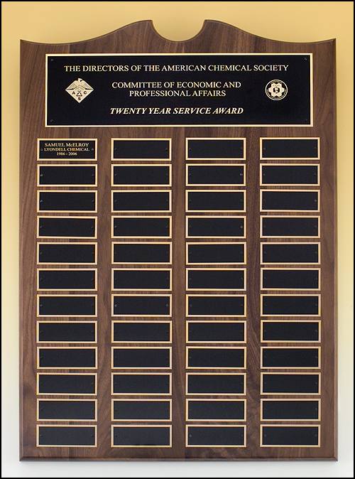 Roster series Traditional American walnut perpetual plaque with notched center top with individual black brass plates are 1.50"x3.75". Available in 4 sizes.