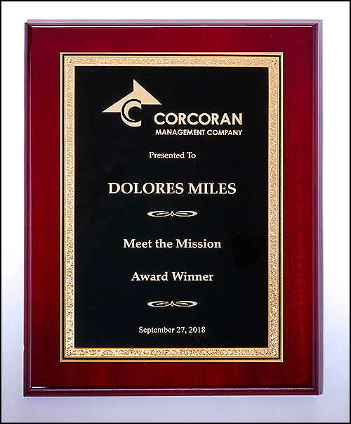 Rosewood piano finish plaque complemented by an elegant black plate with gold flroentine border. Available in 3 sizes.