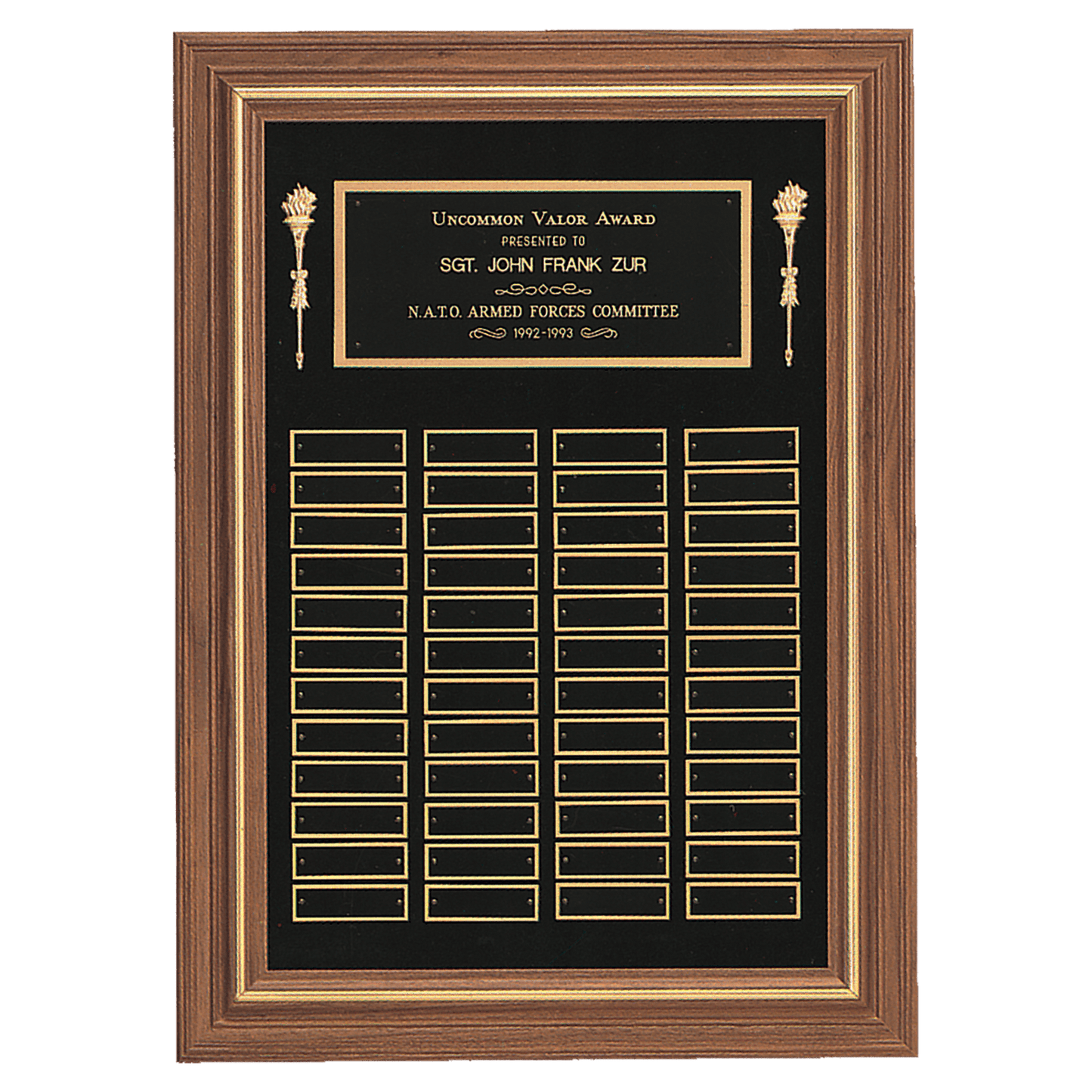 Perpetual plaque with solid American walnut frame on a black velour background with individual black brass plates 0.875"x2.75". Available in 3 plate combinations.
