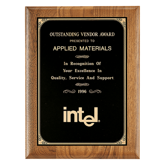 Walnut plaque with a precision elliptical edge with a black brass plate with printed border. Available in 4 sizes.