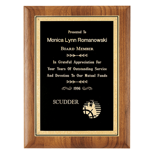 Walnut plaque with a precision elliptical edge with a black brass plate with florentine border. Available in 4 sizes.