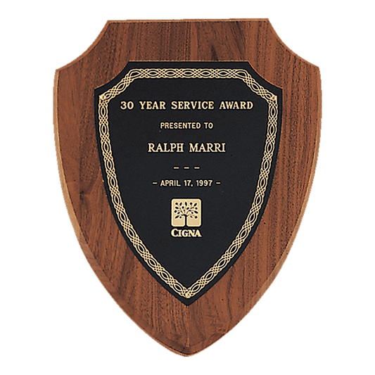 Walnut shield plaque with gold silk screened border and black brass plate. Available in 3 sizes.