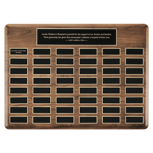 Solid American walnut perpetual plaque with individual black brass plates are 1.50"x3.75". Available in 5 plate combinations.