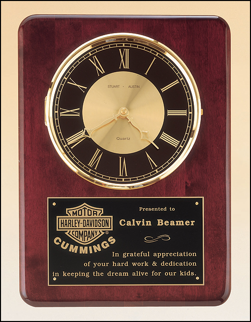 Rosewood plaque with black and gold dial
