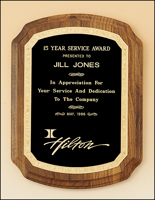 Walnut plaque with notched corners with florentine border design and black brass plate. Availalble in 3 sizes.