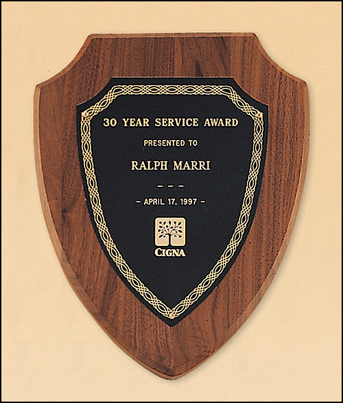 Walnut shield plaque with gold silk screened border and black brass plate. Available in 3 sizes.